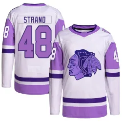 Youth Austin Strand Chicago Blackhawks Hockey Fights Cancer Primegreen Jersey - White/Purple Authentic